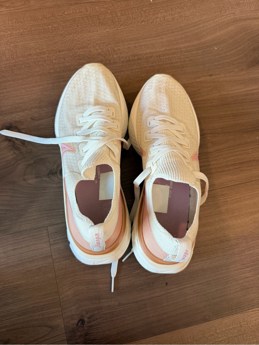Nike Women’s Cream and Pink Lightweight Knit Running Sneakers